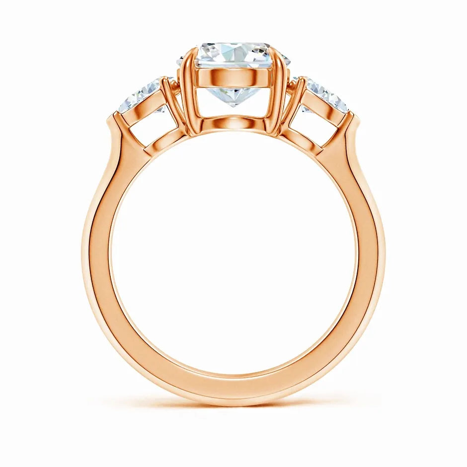 Lab-Grown Oval Diamond and Pear Diamond Three Stone Engagement Ring