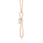 Load image into Gallery viewer, Prong-Set Round Lab-Grown Diamond Ribbon Twist Cross Pendant
