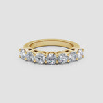 Load and play video in Gallery viewer, Lab-Grown Prong-Set Round Diamond Seven Stone Wedding Ring
