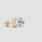 Load and play video in Gallery viewer, Lab-Grown Oval Diamond Solitaire Stud Earrings
