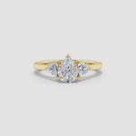 Load and play video in Gallery viewer, Lab-Grown Pear and Trillion Diamond Three Stone Reverse Tapered Shank Engagement Ring
