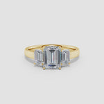 Load and play video in Gallery viewer, Lab-Grown Emerald-Cut Diamond Three Stone Ring

