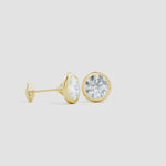 Load and play video in Gallery viewer, Lab-Grown Bezel-Set Diamond Martini Stud Earrings
