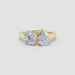 Load and play video in Gallery viewer, Lab-Grown Round &amp; Pear Diamond Two-Stone Engagement Ring
