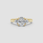 Load and play video in Gallery viewer, Lab-Grown Oval and Trillion Diamond Three Stone Reverse Tapered Shank Engagement Ring
